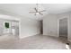Open concept living room that provides clear sight lines to the kitchen and dining area at 1941 White Memorial Church Rd, Willow Springs, NC 27592