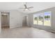 An expansive living room with natural light, high ceilings, and hardwood floors at 1941 White Memorial Church Rd, Willow Springs, NC 27592