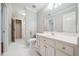 Elegant bathroom featuring a vanity with storage, updated fixtures, and a bright mirror at 200 Greensview Dr, Cary, NC 27518