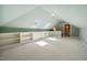 Large bonus room with built-in shelves and bright skylights at 200 Greensview Dr, Cary, NC 27518