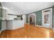 Kitchen features custom cabinets, hardwood floors, and an island with lots of counter space at 200 Greensview Dr, Cary, NC 27518
