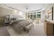 Cozy primary bedroom with sitting area and a large window at 200 Greensview Dr, Cary, NC 27518