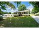 This well-maintained home features a cozy front porch and landscaped yard, perfect for suburban living at 2112 Mckinney St, Burlington, NC 27217