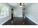 Bright living room showcasing hardwood floors, natural light, and an open floor plan at 2112 Mckinney St, Burlington, NC 27217