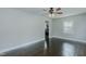 Sunlit living room with hardwood floors, ceiling fan, and neutral paint at 2112 Mckinney St, Burlington, NC 27217