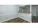 Bright dining area with wood floors and a view into the kitchen at 2821 Regent Park Ln, Burlington, NC 27217
