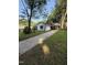 Traditional home with a spacious front yard and a long driveway at 2821 Regent Park Ln, Burlington, NC 27217