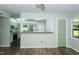 A view of the sage-green kitchen featuring stainless appliances and butcher block at 2821 Regent Park Ln, Burlington, NC 27217