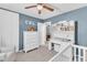 Bright bedroom with chair, dresser, and changing table at 3509 Crofton Ct, Raleigh, NC 27604