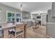 Inviting eat-in kitchen featuring stainless steel appliances, granite countertops, and a kitchen island at 3509 Crofton Ct, Raleigh, NC 27604