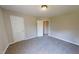 Neutral bedroom features plush carpeting and neutral paint to fit any decor at 417 Downing Glen Dr, Morrisville, NC 27560