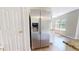 Stainless steel refrigerator in a modern kitchen, near white cabinets and granite countertop, with bright natural light at 417 Downing Glen Dr, Morrisville, NC 27560