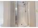 Modern shower with glass door and dual shower head for added comfort at 417 Downing Glen Dr, Morrisville, NC 27560