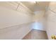 Walk-in closet contains multiple shelves for storage and organization at 417 Downing Glen Dr, Morrisville, NC 27560
