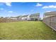 Expansive fenced backyard providing plenty of room for outdoor activities and enjoyment at 4508 Valley Crest Ln, Fuquay Varina, NC 27526