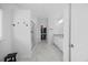 Bright bathroom boasts a walk-in closet, glass shower, double vanity, and modern finishes at 4508 Valley Crest Ln, Fuquay Varina, NC 27526