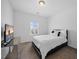 Cozy bedroom with a bed, window, and neutral decor at 4508 Valley Crest Ln, Fuquay Varina, NC 27526