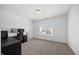 Spacious bedroom features a window and ample room for office and storage at 4508 Valley Crest Ln, Fuquay Varina, NC 27526