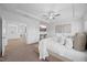 Spacious bedroom with tray ceilings, natural light, and an open-concept layout at 4508 Valley Crest Ln, Fuquay Varina, NC 27526