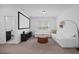 Comfortable living room with a projector screen, contemporary decor, and ample seating at 4508 Valley Crest Ln, Fuquay Varina, NC 27526