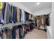Spacious walk-in closet features ample hanging space, shelving, and room for storage at 4508 Valley Crest Ln, Fuquay Varina, NC 27526