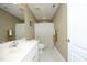 Bathroom featuring a white vanity, toilet, and shower with a decorative curtain at 4601 Basilica Dr, Holly Springs, NC 27540