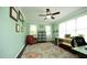 Bright office space with natural light, a ceiling fan, and colorful rug at 4601 Basilica Dr, Holly Springs, NC 27540