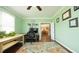 Office space with an open view to the dining room and natural light at 4601 Basilica Dr, Holly Springs, NC 27540