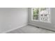Bright bedroom with big windows and soft carpet at 509 Sherron Road # 9, Durham, NC 27703