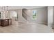 Bright living room with wood floors flows into kitchen and staircase to upper level at 509 Sherron Road Dr # 10, Durham, NC 27703