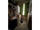 The laundry room with window provides space for essential chores at 535 Hillcrest Dr, Garner, NC 27529