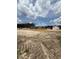 Image shows a construction site with the foundation laid for multiple new buildings at 59 Pine Vista Way, Sanford, NC 27332