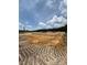Image shows a construction site with the foundation laid for a new building at 59 Pine Vista Way, Sanford, NC 27332