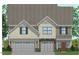 Charming two-story home with a symmetrical facade, stone accents, and attached two-car garage at 60 Black Walnut Dr # 198, Garner, NC 27529