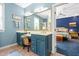 Bright bathroom with double vanity, mirror, and an attached bedroom that is well-lit at 7401 Heartland Dr, Wake Forest, NC 27587