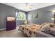 Inviting bedroom with soft lighting, colorful accents, and cozy bedding for a relaxing atmosphere at 7401 Heartland Dr, Wake Forest, NC 27587