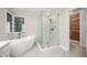 Elegant bathroom featuring a soaking tub and glass-enclosed shower at 7605 Sandy Lake Ct, Raleigh, NC 27613