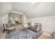 Open bedroom with a view to the other side, featuring a ceiling fan at 7605 Sandy Lake Ct, Raleigh, NC 27613