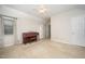 Spacious bedroom featuring a piano, neutral carpet, and natural light at 7605 Sandy Lake Ct, Raleigh, NC 27613