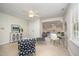 Open bedroom featuring a ceiling fan, carpet, and closet doors at 7605 Sandy Lake Ct, Raleigh, NC 27613