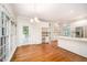 Eat-in kitchen offers natural light and access to the backyard area at 7605 Sandy Lake Ct, Raleigh, NC 27613