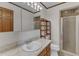 Bathroom featuring vanity, mirror, and glass door shower at 8121 Bentwood Pl, Raleigh, NC 27615