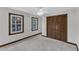 Bedroom with windows, closet and carpet at 8121 Bentwood Pl, Raleigh, NC 27615