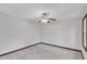 Bedroom with neutral carpet, ceiling fan and window at 8121 Bentwood Pl, Raleigh, NC 27615