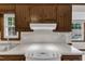 Kitchen featuring white appliances and wood cabinets at 8121 Bentwood Pl, Raleigh, NC 27615