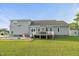 Charming backyard featuring a patio area perfect for outdoor entertaining at 817 Mossy Oak Dr, Fuquay Varina, NC 27526