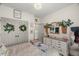 Bright bedroom featuring a bed and natural decor at 817 Mossy Oak Dr, Fuquay Varina, NC 27526