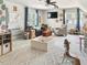Versatile bonus room with ample seating, custom design elements, and windows for natural light at 817 Mossy Oak Dr, Fuquay Varina, NC 27526