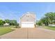 Charming home with a spacious driveway and attached two-car garage, perfect for a Gathering at 817 Mossy Oak Dr, Fuquay Varina, NC 27526