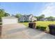 Lovely home with a detached garage and well-manicured lawn at 817 Mossy Oak Dr, Fuquay Varina, NC 27526